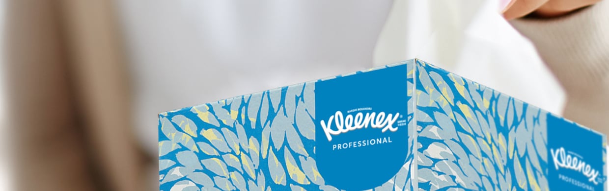 Closeup of a blue decorative box of Kleenex® boutique facial tissues.