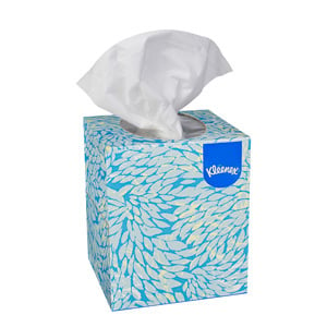 A blue decorative box of Kleenex® boutique facial tissues on a white background.