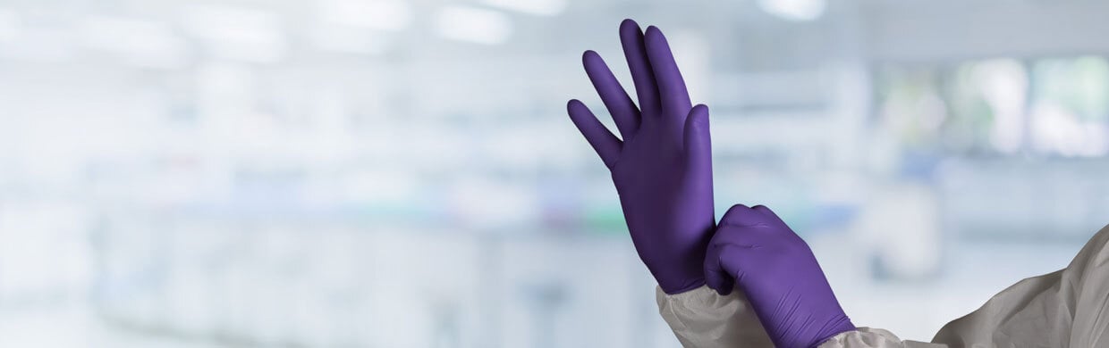 A pair of Kimtech® Purple Nitrile Gloves.