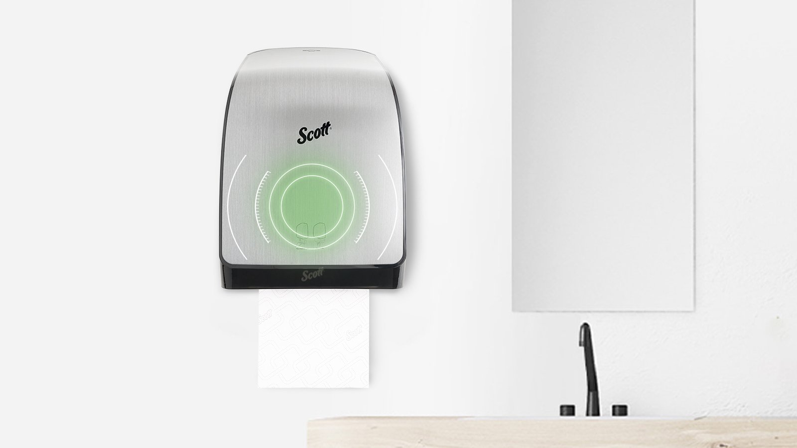 Smart technology paper towel and soap dispensers mounted on restroom wall
