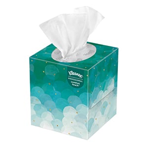 A green decorative box of Kleenex® boutique facial tissues on a white background.