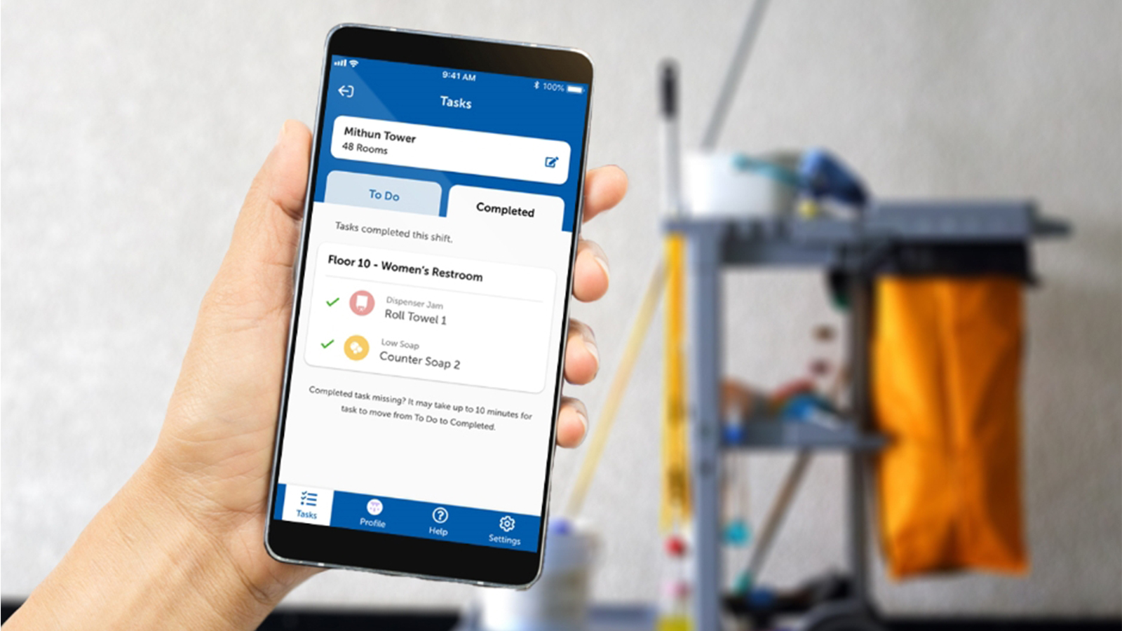 A cell phone displaying the Onvation cleaner app and an image of a facility cleaner.