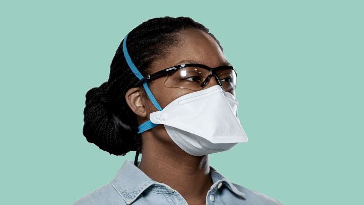 African-American woman wearing Kimtech® pouch-style N95 respirator