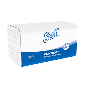 A white and black Scott® Control slimfold towel dispenser on a white background.