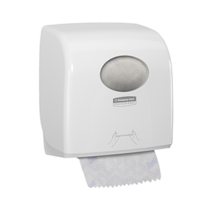 A white and black Scott® Control slimfold towel dispenser on a white background.